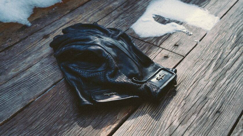 leather bag on wooden surface